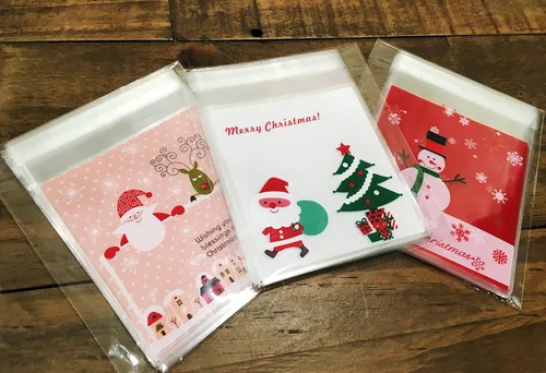 Vista 2 de Muñeco de nieve de Papá Noel, corona de plástico de celofán, bolsas autoadhesivas, 75 unidades, 3 diferentes