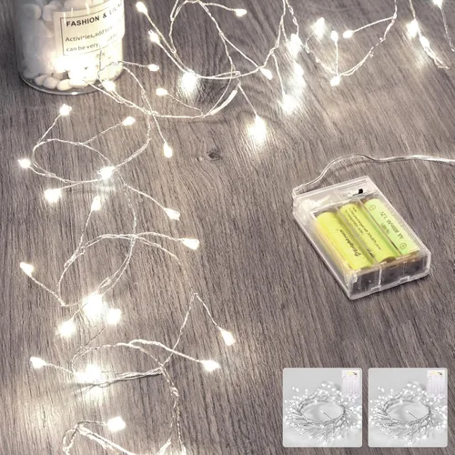 Vista 19 de Luces de hadas que funcionan con pilas, luces de cuerda centelleantes impermeables con cable plateado de 5 pies y 60 LED, luces de fuegos
