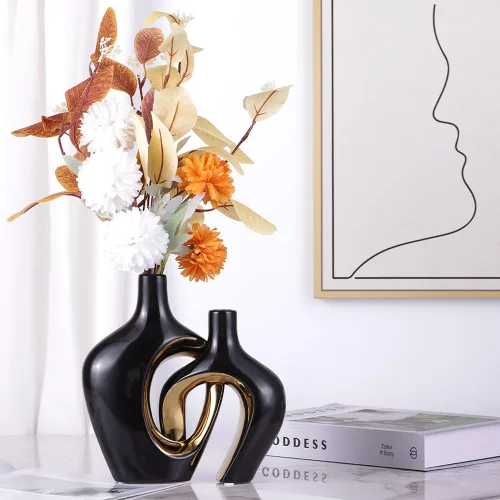 Vista 7 de Juego de 2 jarrones de cerámica huecos negros y dorados, estilo estético decorativo moderno nórdico bohemio ins, jarrones decorativos de flores