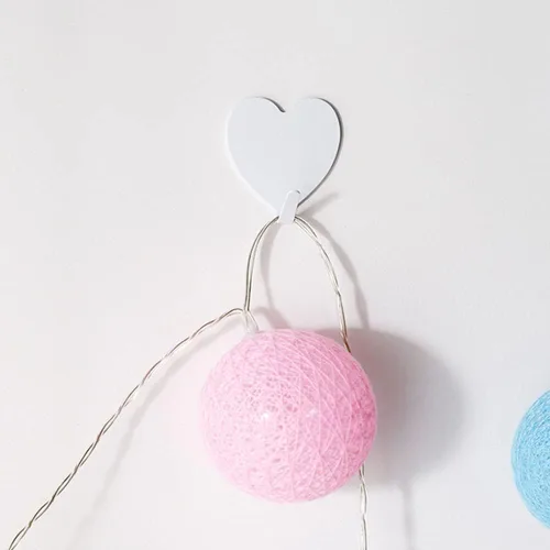 Vista 5 de JtmyAota Paquete de 12 ganchos decorativos de pared en forma de corazón, gancho de pared adhesivo fuerte de acero inoxidable para el hogar, cocina