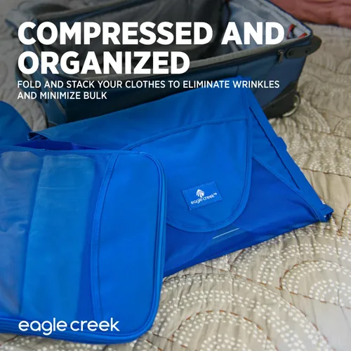 Vista 4 de Eagle Creek Pack-It - Carpeta original para ropa, bolsas de ropa perfectas para viajes, con tabla plegable sin arrugas y alas de compresión
