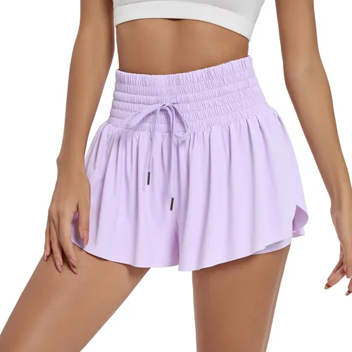 Vista 3 de Blaosn Pantalones cortos deportivos fluidos para mujer, entrenamiento, correr, gimnasio, yoga, cintura alta con bolsillos, pantalones cortos