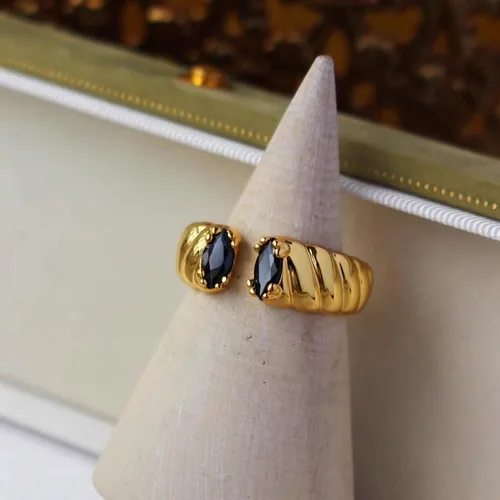 Vista 4 de Anillo trenzado de acero inoxidable chapado en oro vintage con circonita cúbica ovalada, ajustable, para mujer