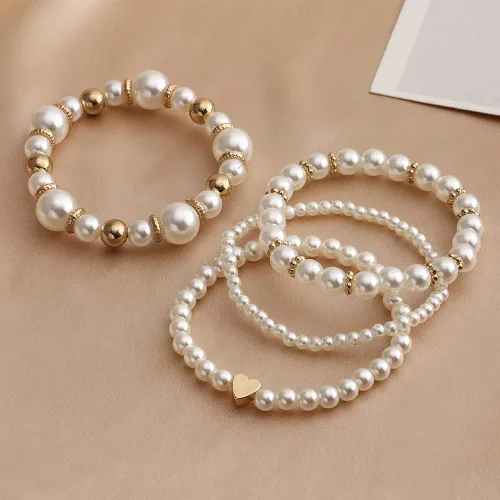 Vista 2 de Caiyao Juego de pulseras elásticas de perlas de imitación para mujer, multicapa con cuentas bohemias de semillas de arroz, hilo de perlas apilable