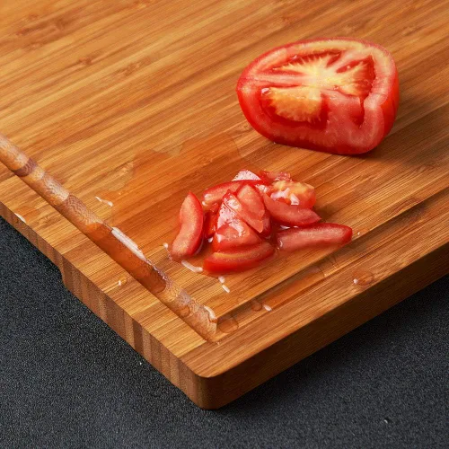 Vista 5 de Tabla de cortar de madera de bambú para cocina, bloque grande de 18 pulgadas para cortar embutidos de queso con asas laterales y ranuras para jugos