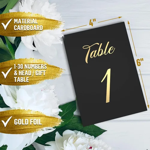 Vista 3 de Números de mesa negros del 1 al 30 con letras doradas y 30 soportes dorados para números de mesa