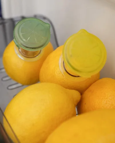 Vista 5 de YZC Exprimidor de limón, paquete de 2 exprimidores de limón, exprimidor de lima de plástico sin BPA, extractor de jugos compacto, prensa de cítricos