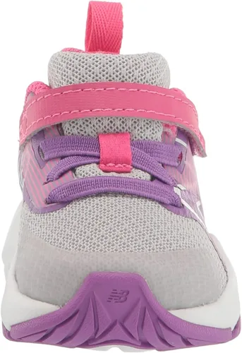 Vista 2 de New Balance Tenis unisex para correr con velcro para niños Rave V2