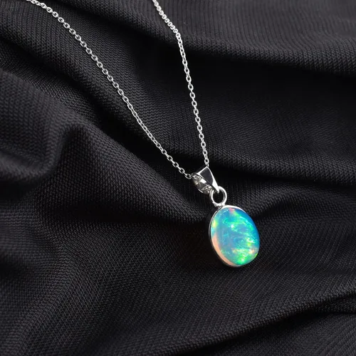 Vista 2 de Collar de plata de ley para mujer, dije delicado de bisel ovalado de ópalo etíope, joyería hecha a mano con piedra natal de octubre, cadena de plata