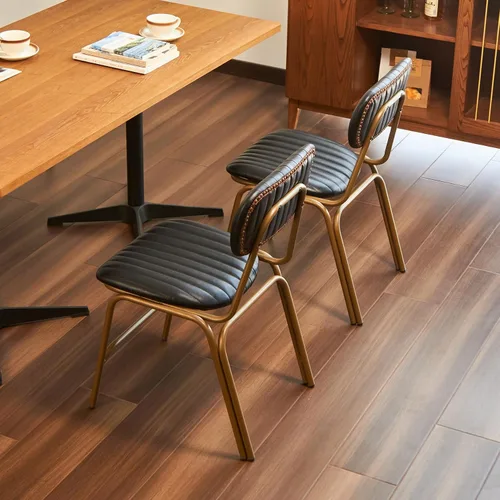 Vista 4 de Juego de 2 sillas de comedor modernas de mediados de siglo, sillas retro con asiento/respaldos tapizados de piel sintética y patas de metal Negro