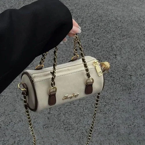 Vista 4 de Bolso cilíndrico de cadena vintage, bolso de mano suave de ante para mujer, bolso de mensajero para grupo pequeño con sentido avanzado, Beige