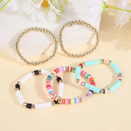Vista 4 de Wonlte - Juego de pulseras de cuentas de arcilla Heishi, pulseras elásticas apilables con cuentas de mal de ojo, pulseras elásticas apilables