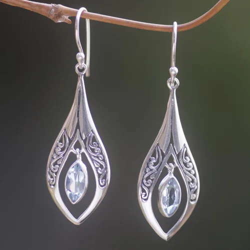 Vista 4 de NOVICA Aretes colgantes artesanales hechos a mano con topacio azul, plata de ley 925, piedra natal indonesia, lágrimas azules, Plata, No es una