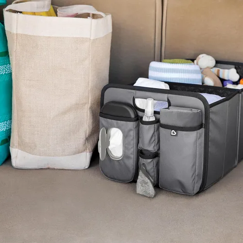 Vista 5 de Organizador de maletero Munchkin Out-n-About para SUVs y coches con almohadilla portátil para cambiar pañales y toallitas húmedas para bebés