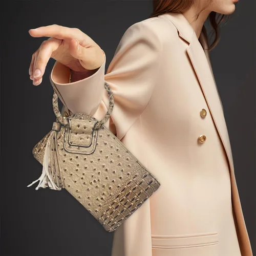 Vista 2 de NGIL Mini bolso de pulsera de piel sintética para mujer con borla de flecos, cartera de pulsera para mujer