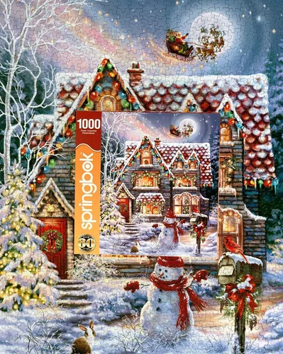 Vista 3 de El rompecabezas de 1000 piezas Navidad en la cabaña de la víspera de Navidad de Springbok es una imagen clásica de una acogedora cabaña navideña