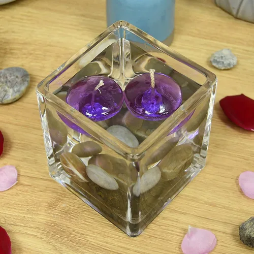 Vista 6 de Zest Candle Velas flotantes de 12 piezas, 1.75 pulgadas, gel morado transparente