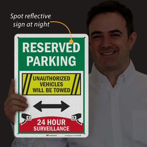 Vista 3 de SmartSign Letrero de "Estacionamiento reservado - Vigilancia 24 Horas, Vehículos No Autorizados Serán Remolcados" Aluminio reflectante de grado