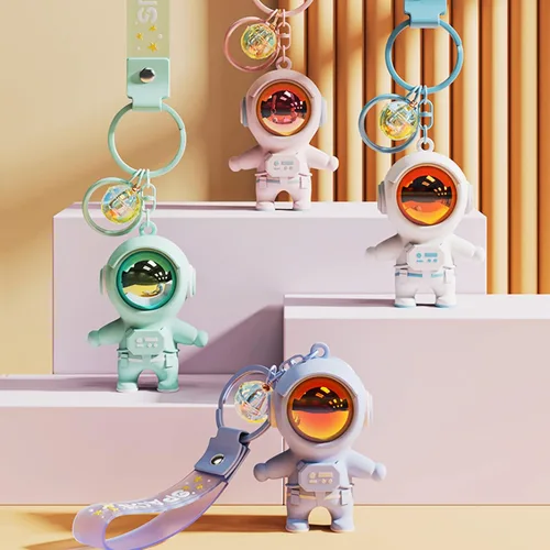 Vista 7 de YOU WIZV Llavero de astronauta, lindos llaveros Kawaii de anime geniales para mochilas, llaveros espaciales con luz de puesta de sol para mujeres