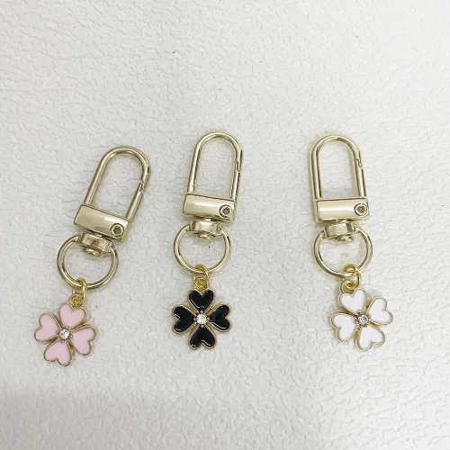 Vista 9 de SWJEWEL 4 llaveros de flores lindo bolso llavero personalizado llavero dorado para mujeres niñas coche regalo creativo