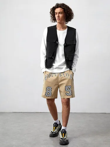 Vista 5 de Verdusa Chaleco tipo cargo steampunk sin mangas con hebilla con cremallera y bolsillo con solapa para hombre