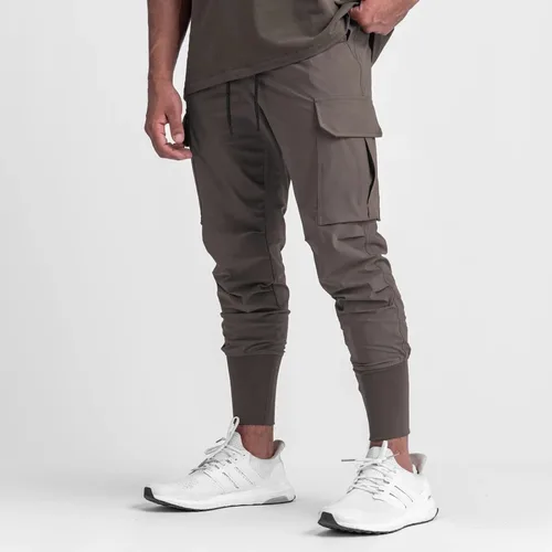 Vista 2 de Pantalones deportivos para hombre, pantalones deportivos ajustados para entrenamiento, gimnasio, senderismo, pantalones deportivos con múltiples