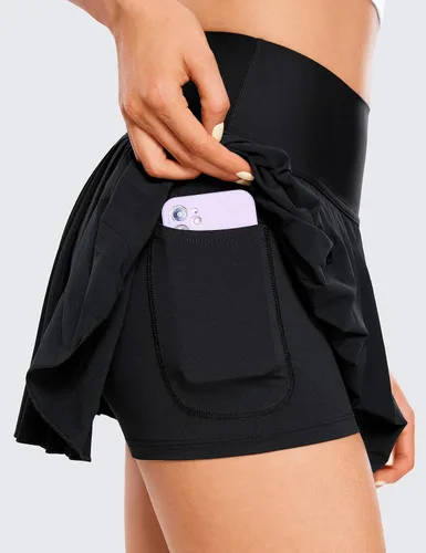 Vista 4 de CRZ YOGA Faldas de tenis plisadas de cintura alta para mujer con bolsillos para control de abdomen, faldas de golf y entrenamiento casual