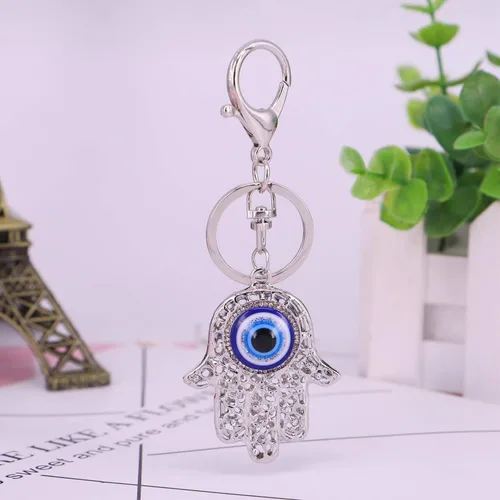 Vista 6 de QTKJ Llavero de mano Hamsa de ojo azul con dije de cristal para bolso de mano, bolso de mano, decoración de vacaciones, adorno (plata), Dorado