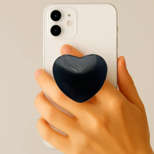 Vista 4 de Accesorio transparente para teléfono móvil en forma de corazón, soporte plegable de resina negra, base elástica transparente, adecuado