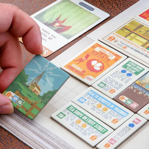 Vista 4 de AEG & Juegos planos Ajuste para imprimir Construye tu periódico De los creadores de Cascadia Fácil de aprender Rápido de jugar A partir