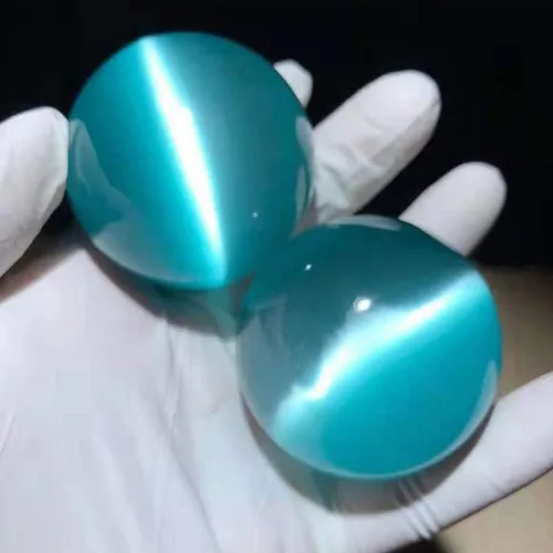 Vista 2 de Bolas Baoding de cristal artificial de ojo de tigre azul claro de 1.57 pulgadas, bolas de salud chinas de cuarzo curativo para terapia de manos