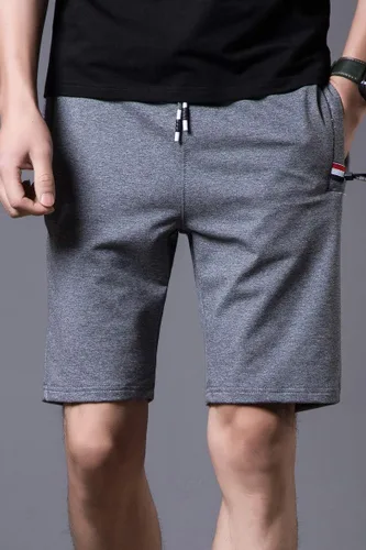 Vista 3 de Pantalones cortos casuales de verano de algodón de ajuste clásico con cintura elástica y bolsillos con cremallera