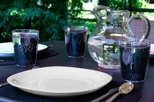 Vista 2 de Kraftware Mantel individual ovalado de red para cualquier mesa de exterior, negro, juego de 6, pequeño