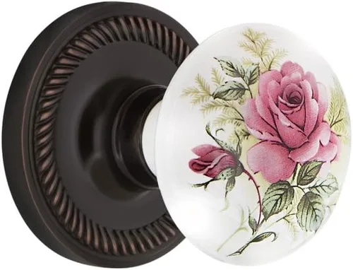 Vista 4 de Nostalgic Warehouse 711306, Mortaja de 2.25 pulgadas, roseta de cuerda de latón antiguo con perilla de porcelana rosa blanca