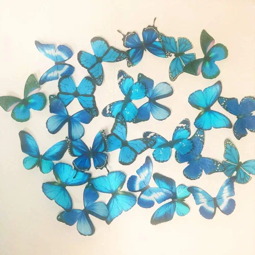 Vista 4 de Mariposas comestibles azules para decoración de pasteles 24 veces cumpleaños boda
