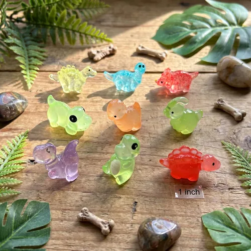 Vista 4 de Paquete de 9 bombas de baño de dinosaurios con juguetes sorpresa