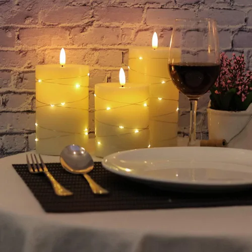 Vista 7 de Eldnacele Velas sin llama que funcionan con pilas con control remoto y temporizador, tira de luces LED de cera real, velas LED de pilar de cera