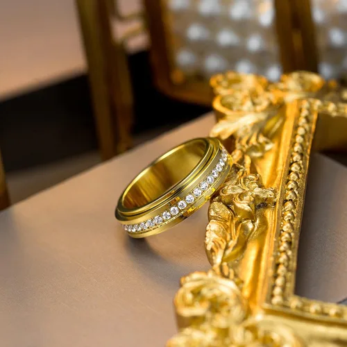 Vista 4 de Kainier Anillos de ansiedad chapados en oro de 14 quilates piedras de circonita cúbica anillos giratorios para mujeres y hombres anillos