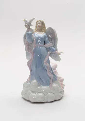 Vista 7 de Cosmos Gifts 1334 - Figura inspiradora de porcelana fina con diseño de ángel de la paz sosteniendo paloma, caja de música