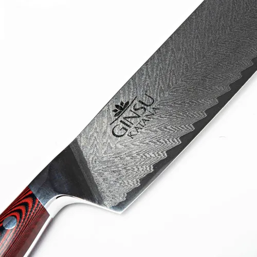 Vista 2 de Cuchillo japonés de acero inoxidable Damasco AUS-10, 7" Núcleo de acero japonés AUS-10 con acero Damasco de 67 capas para un rendimiento de corte