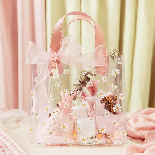 Vista 6 de YMASELA Bolsa de regalo transparente con asas (9.8 x 9.1 x 5.5 pulgadas, 2 unidades) bolsa de embalaje de regalo impermeable de plástico resistente