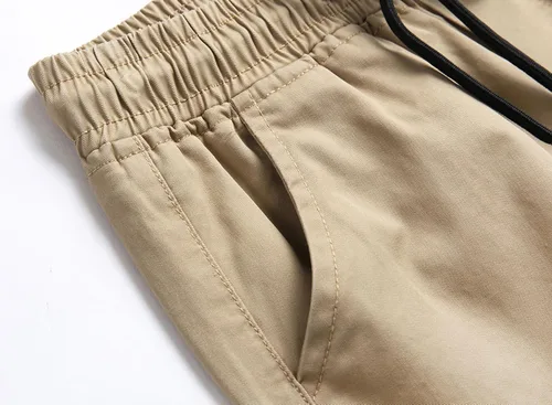 Vista 3 de LOKTARC - Pantalones de chándal con cordón para niños, diseño de camuflaje