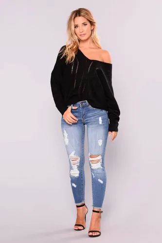 Vista 3 de Jeans de tiro alto y ajustados para mujer, diseño elástico y rasgado