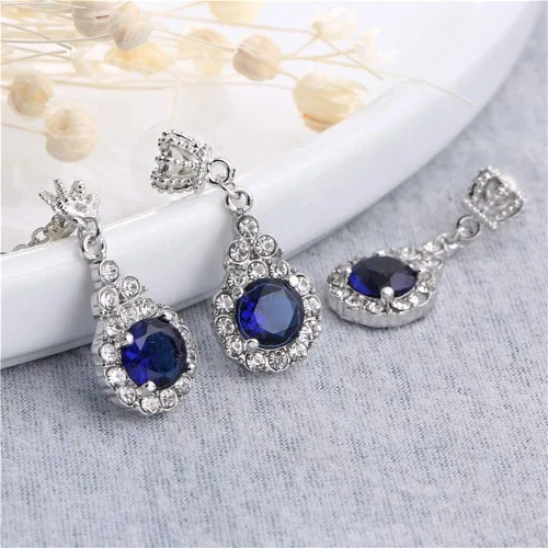 Vista 6 de AILUOR Juego de joyas de zafiro con corona, moda nupcial de plata Swarovski Elements, collar y pendientes de tuerca para mujer y niña