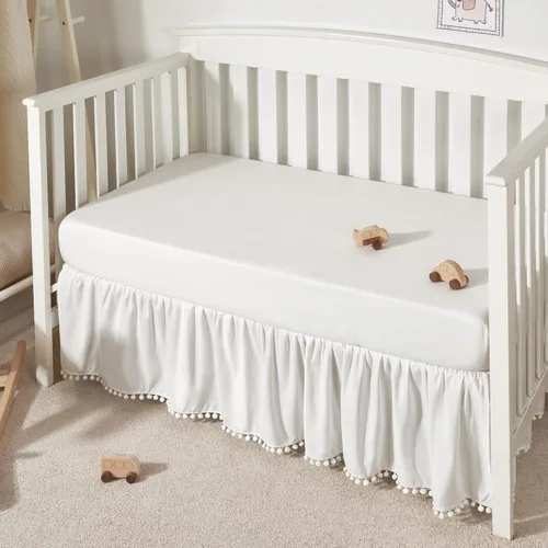 Vista 7 de TILLYOU Falda de cuna de bebé para niñas y niños, falda de cama con volantes con pompones, 28 x 52 pulgadas, caída de 14 pulgadas, rosa