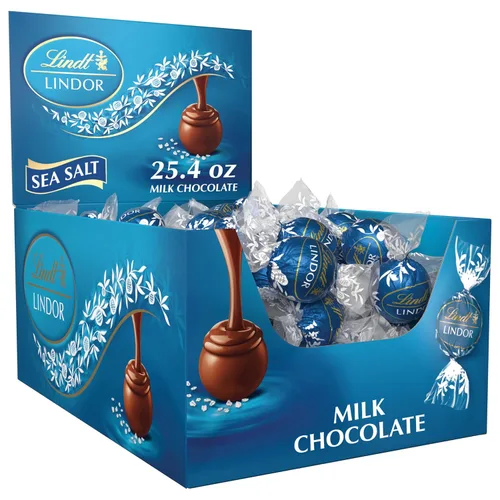 Vista 12 de Lindt LINDOR Caja de Regalo Tradiciones de Trufas de Chocolate con Leche, Caramelo de Chocolate con Leche con Centro de Trufa Suave y Derretido, 6.8