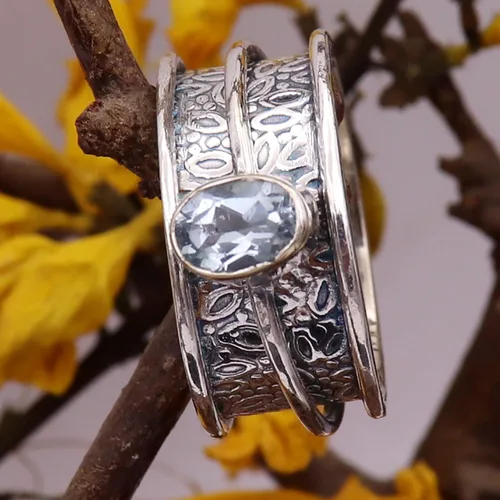 Vista 2 de Goyal Exports SRG328A - Anillo giratorio de plata de ley 925 con topacio azul