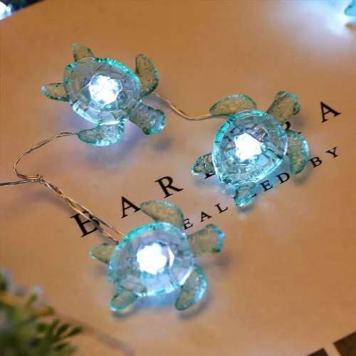 Vista 3 de WSgift Guirnalda de luces decorativas de tortuga marina, 18.7 pies, 40 luces LED USB enchufables con cable de cobre plateado, luces de hadas