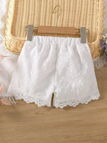 Vista 2 de WDIRARA Pantalones cortos bohemios bordados con ojales y cintura elástica y ribete festoneado para niña pequeña