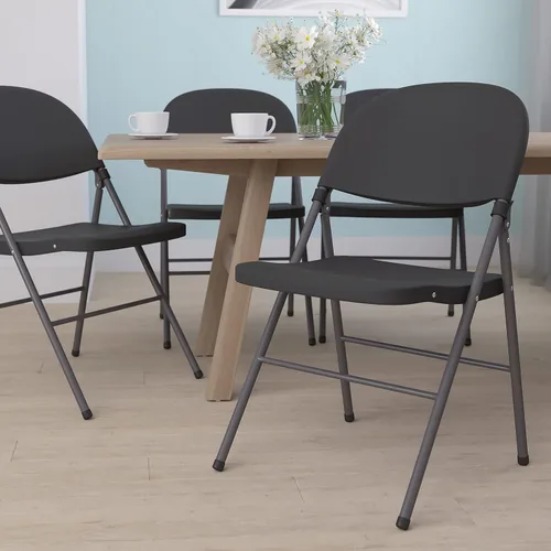 Vista 12 de Flash Furniture HERCULES Series Silla plegable de plástico negro con marco de carbón de 330 libras